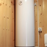 electric water heater hanging on the wooden wall